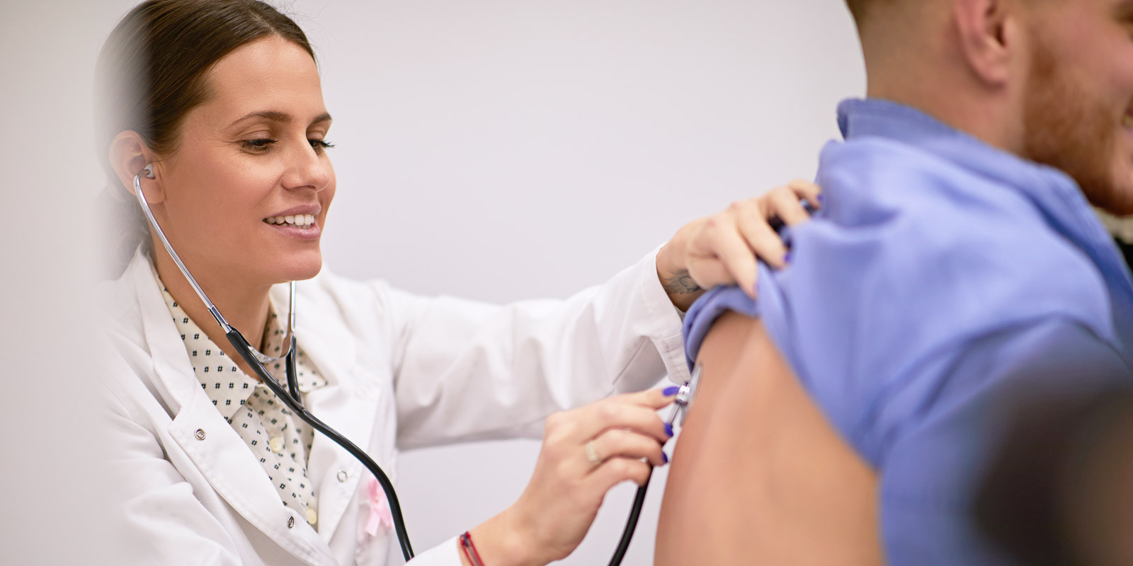 young guy having his lungs examined